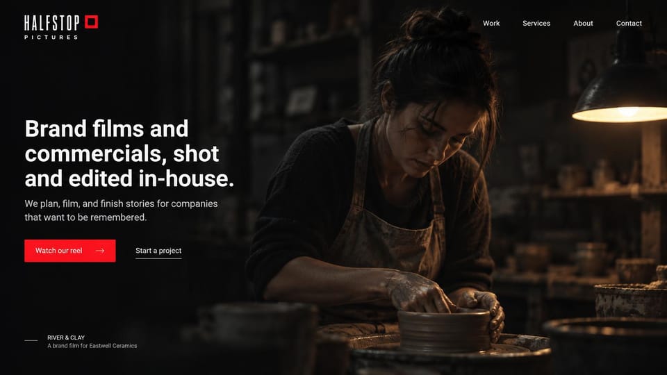Videographer website design, brand films with the hero film credited: dark pottery studio, a woman shaping clay at a wheel under a hanging lamp, bold white sans headline at left, red reel button, a small film credit at bottom left