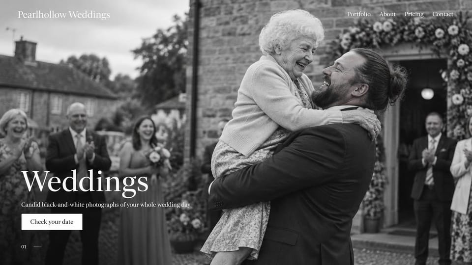 Wedding photographer website design, black and white wedding photographer with a joyful family hug: full-screen black-and-white photo of a groom lifting a laughing grandmother as guests clap, a white serif logo and menu, a large white headline at lower left and a white button