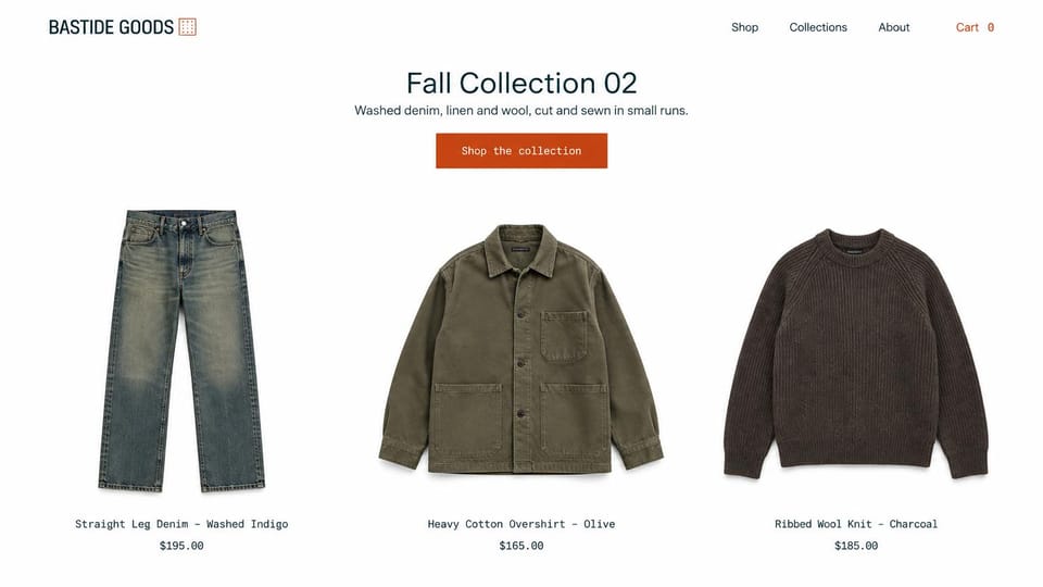 Fashion website design, product-first capsule with three cards and no model: white page, a condensed logo, a centered dark headline and a rust button above three product cards for washed jeans, an olive overshirt and a brown knit