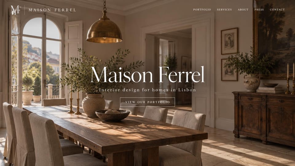 Interior design website design, classic city homes with the name as headline: a sunlit classic dining room with a brass pendant, the studio name in large white serif and an outlined button