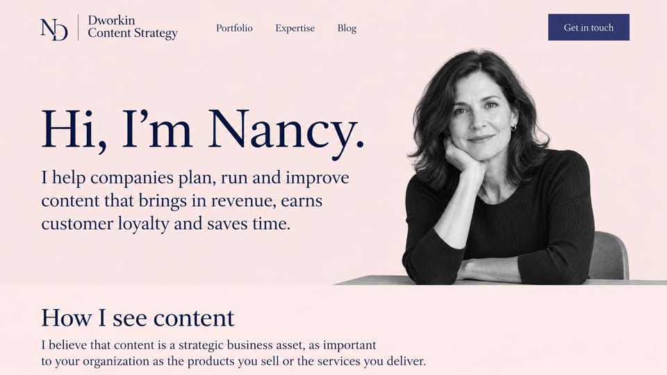Marketing portfolio website design, content strategist in blush with a black and white portrait: blush page, a large navy serif greeting, a black and white portrait of a woman leaning on a table and a navy button