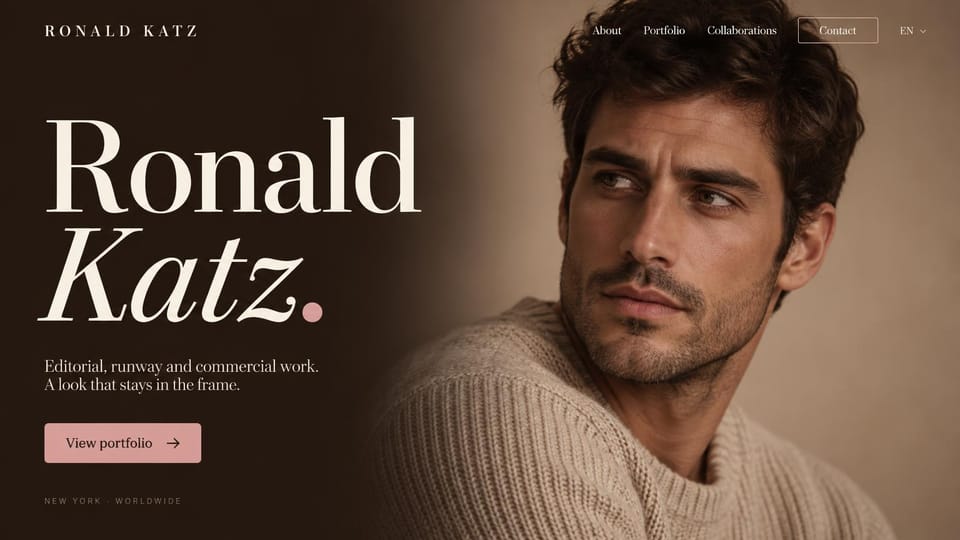 Model portfolio website design, male model with an oversized serif name: dark warm brown page, a huge cream serif name with an italic surname, a pink portfolio button, a close-up of a man in a knit sweater