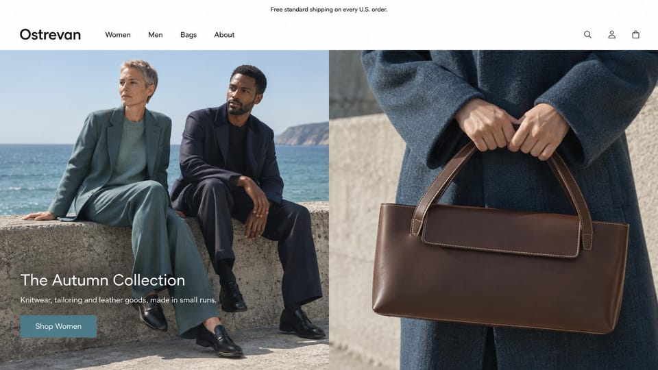 Fashion website design, tailoring and leather totes in a seaside split: white header, split hero of a woman in a sage suit and a man in navy on a sea wall and a close-up of a brown leather tote, a white headline and a slate blue button