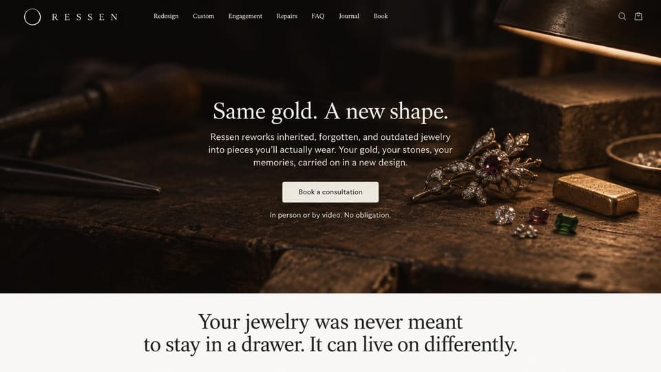 Jewelry website design, jewelry redesign studio on a dark workbench: dark photo of a jeweler's workbench with an antique brooch, loose gems and a gold bar, spaced white wordmark with a ring mark, white serif headline, cream consultation button, cream section below