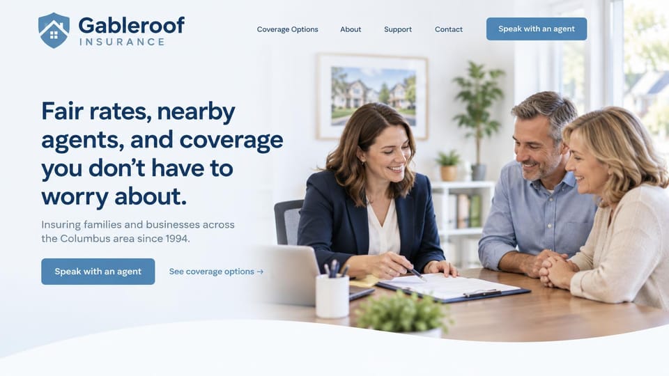 Insurance agency website design, local agency with a soft blue office meeting: pale blue and white page, a navy headline, a steel blue agent button and an agent reviewing papers with a smiling couple at an office table