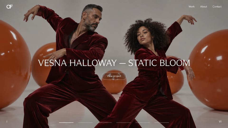 Fashion website design, designer portfolio with a full-screen slider: full-screen photo of two dancers in burgundy velvet suits among orange spheres, a thin white uppercase title and a progress bar