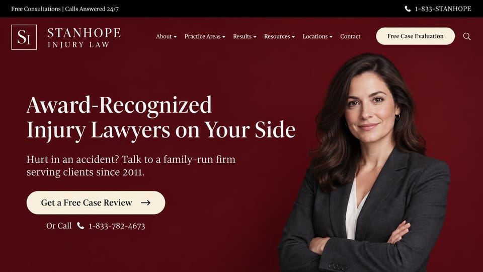 Law firm website design, family-run injury firm in burgundy: deep burgundy, an attorney portrait, serif headline and a phone number in the top bar