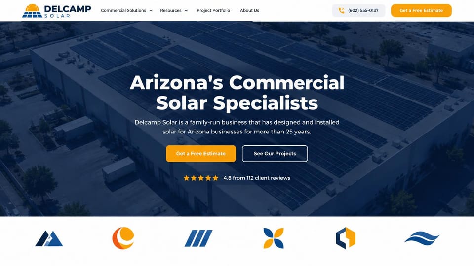 Solar website design, commercial solar with an aerial warehouse roof: white menu with a phone pill and an orange estimate button, a navy-tinted aerial photo of a warehouse covered in panels, a centered white headline, orange and outlined buttons, a star line, a row of six abstract logos