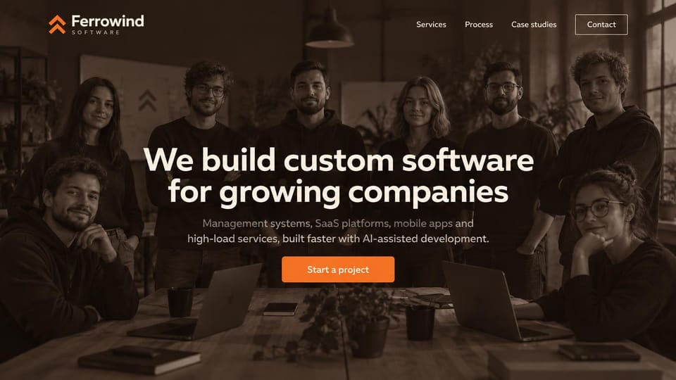 IT company website design, custom software shop with a team photo: sepia-toned photo of a software team around a table, centered cream headline, orange start a project button