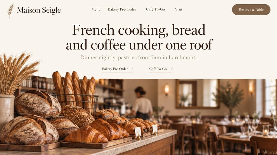 Bakery website design, french bakery and bistro under one roof: cream page, a dark serif headline above a counter of baguettes, loaves and croissants, a dining room behind