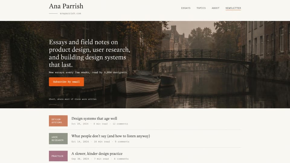 Blog website design, design writer with essays and a signup: a moody canal and bridge photo with cream serif text, an orange subscribe button and a post list