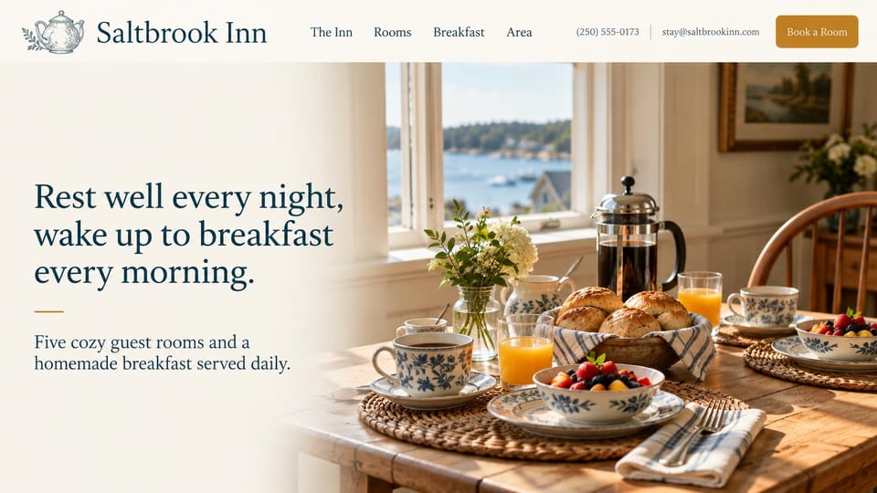 Bed and breakfast website design, small seaside inn with breakfast by the window: cream page, a navy serif headline with a gold rule, breakfast with a French press, rolls and blue and white china by a window over a harbor, a gold book button