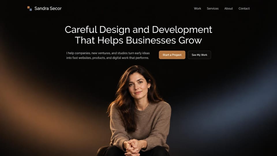 Developer portfolio website design, freelance designer and developer in warm light: black page with soft amber and blue glows, a centered white headline, a copper button and a seated portrait of a woman