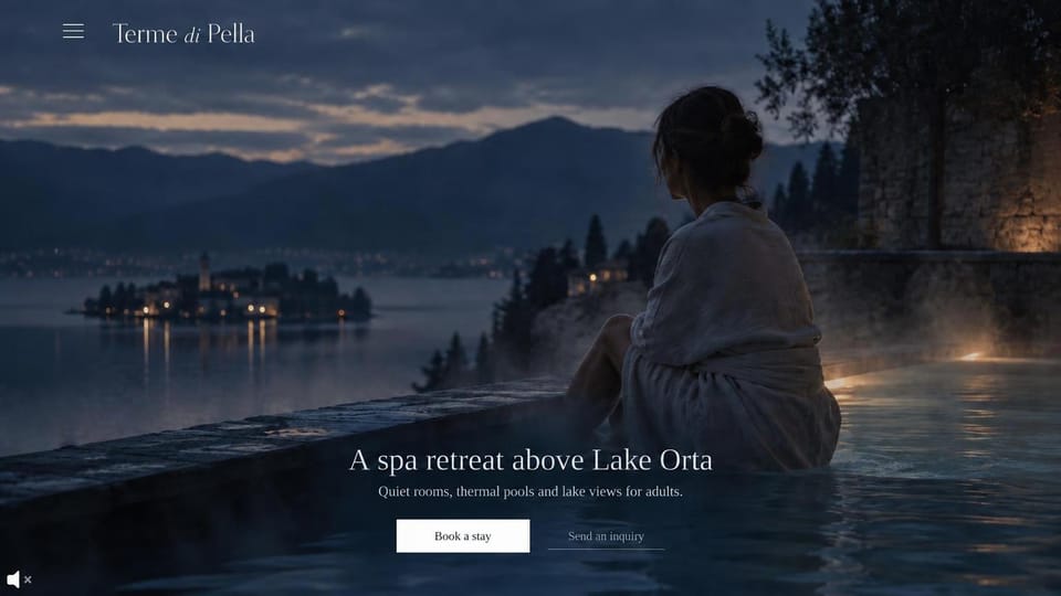 Hotel website design, adults-only spa above a lake: a woman in a thermal pool at dusk above a lake and island, a small white serif headline and buttons