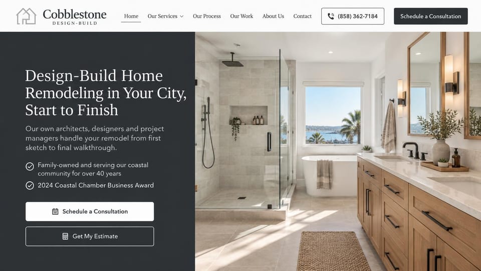 Contractor website design, design-build bathrooms with a split hero: charcoal text panel with a serif headline beside a bright white bathroom with a glass shower