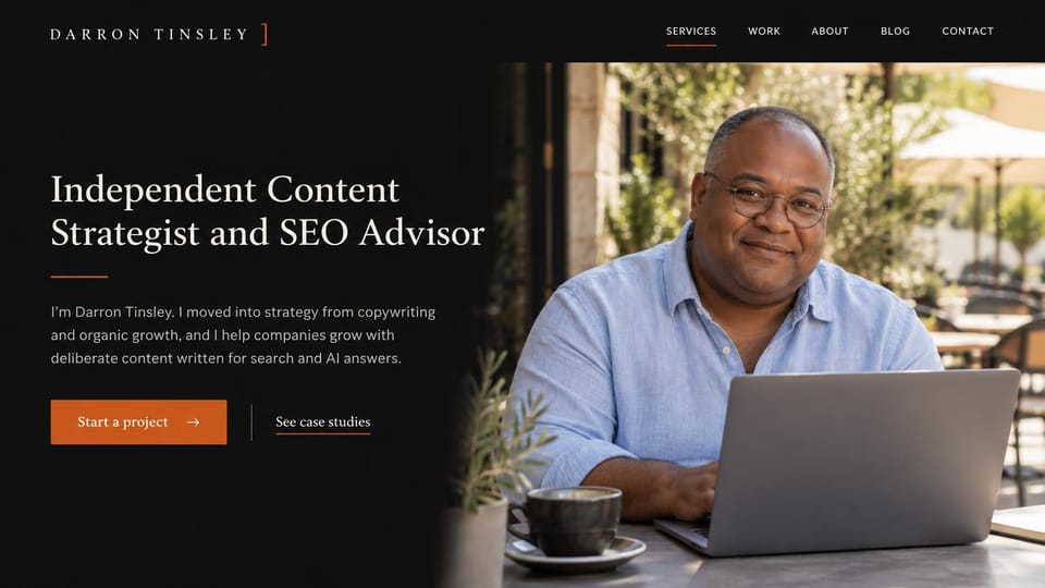 Resume website design, sEO content strategist at a sunny cafe table: near-black panel, cream serif headline, orange start a project button, smiling man in glasses at a laptop at a cafe table