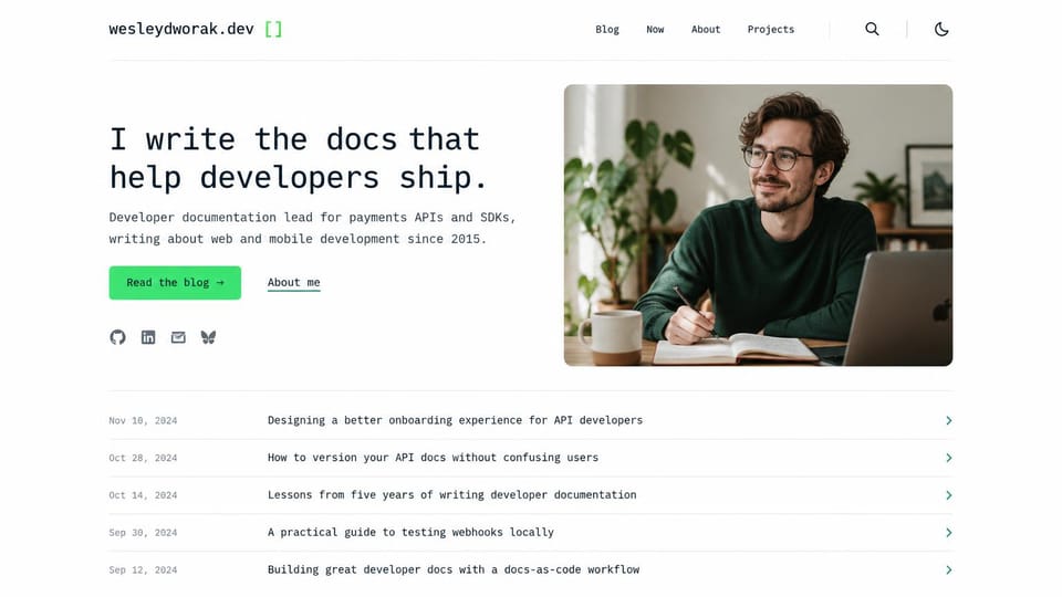 Personal website design, technical writer with a post list: white page, a monospace headline and green button beside a man writing at a desk, a dated article list