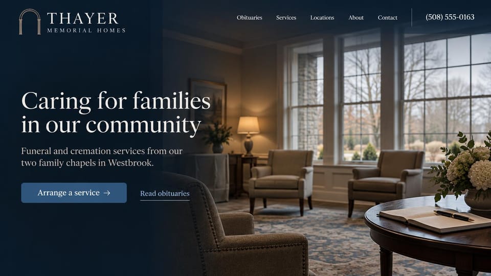 Funeral home website design, family funeral home with a lamplit arrangement room: dark navy fade over a lamplit sitting room with armchairs, tall windows and a guest book on a round table, a white serif headline, a blue button and an obituaries link
