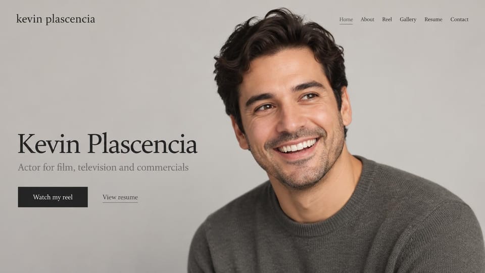 Actor website design, film and commercial actor with a warm close-up: warm gray page, a dark serif name, a black reel button and a large close-up of a smiling dark-haired man in a gray sweater