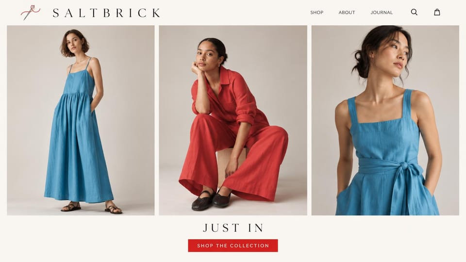 Fashion website design, new dresses in a row of three studio photos: cream page with a spaced serif logo, three studio photos of women in a blue linen dress and a red jumpsuit, spaced caps and a red button below