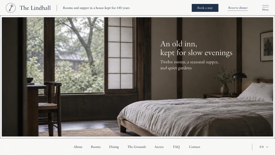 Hotel website design, old inn with supper and rooms: ivory frame around a dim inn bedroom by a window, a navy book button and dinner link in the header
