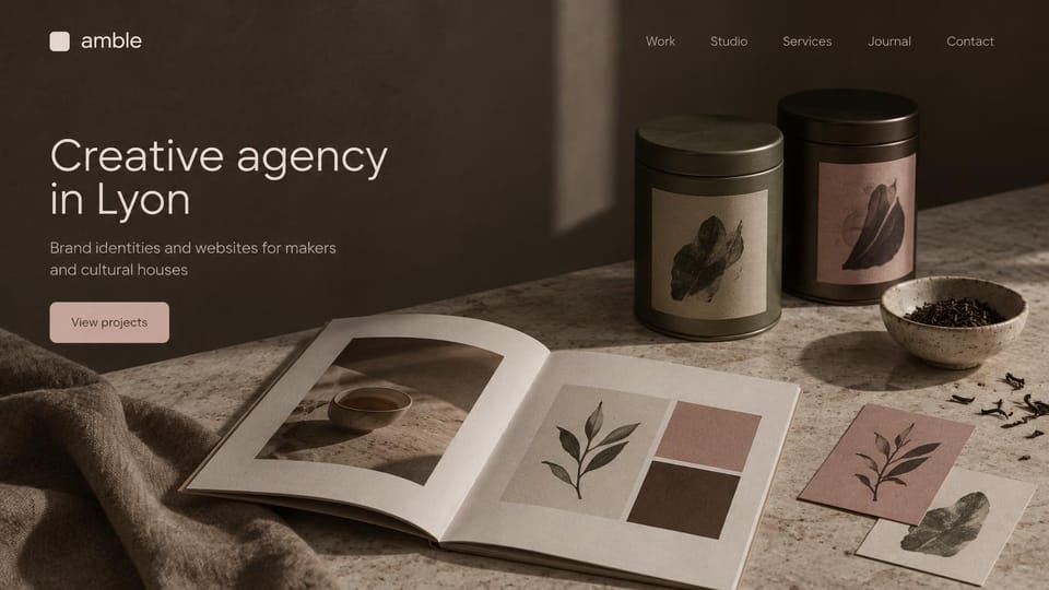 Business website design, brand and web studio for makers in earthy browns: dark brown page, a large cream headline, a blush button and tea tins beside an open book on stone