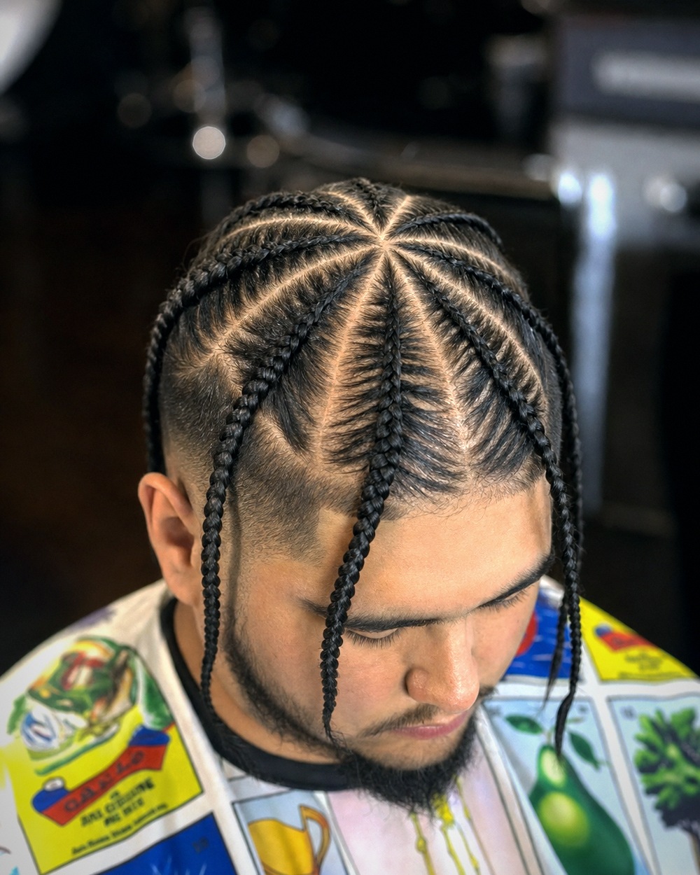 Cornrows braided straight back with a taper
