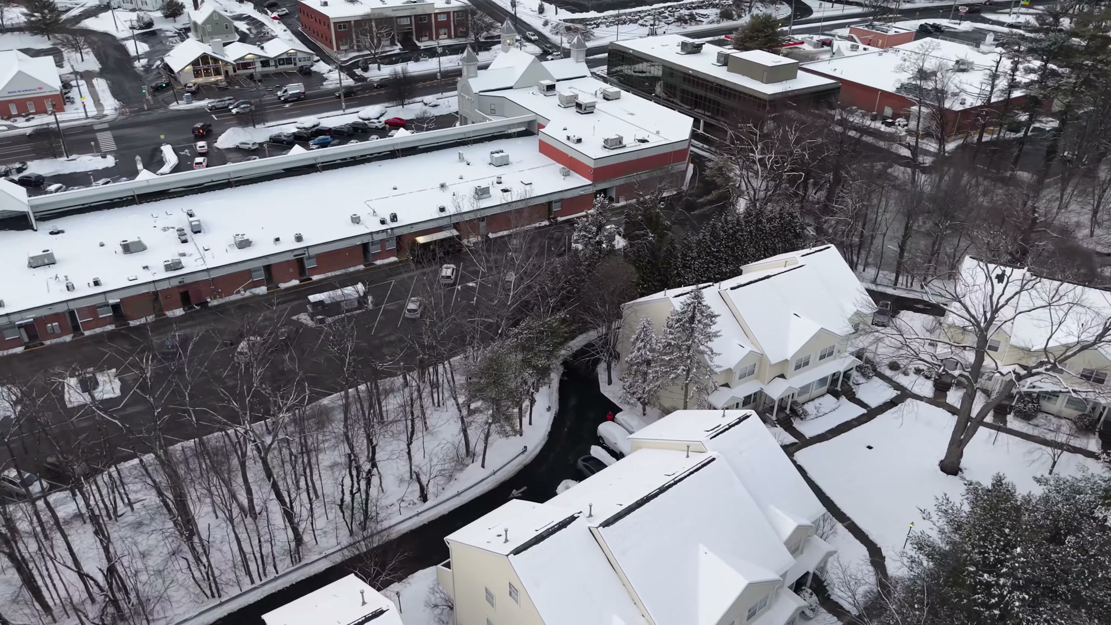 Aerial view in winter of the condo community at 180 Turn of River Road
