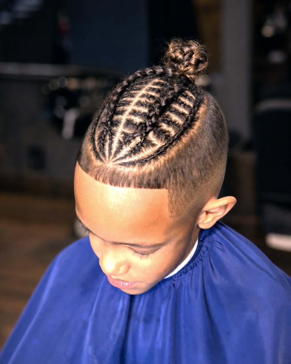 Kids braided top over a shaved fade