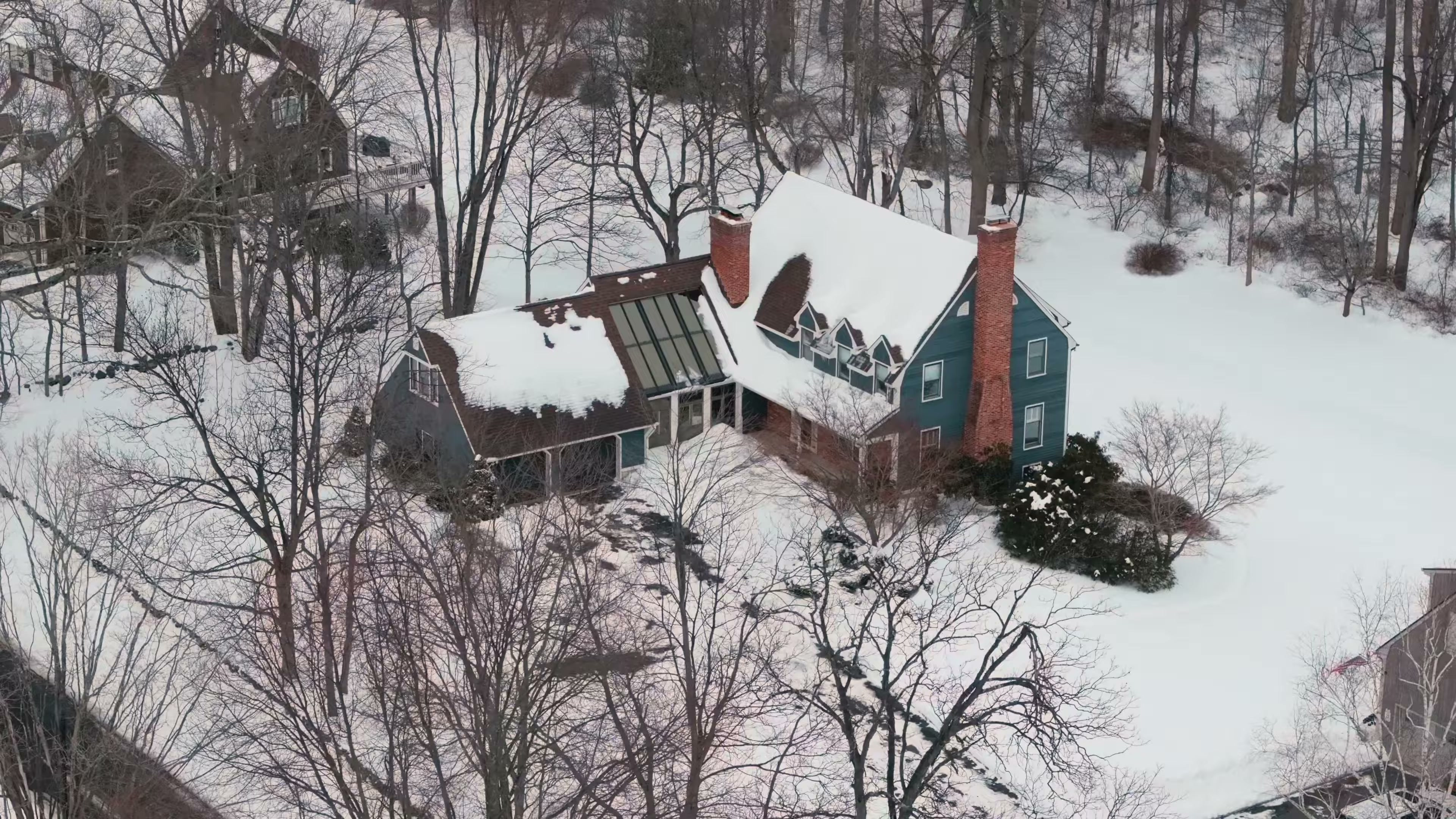 Aerial view over the snow-covered property at 35 Davenport Farm Lane East